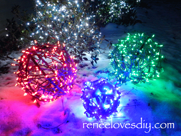 Balls wrapped in Christmas lights creates a beautiful outdoor Christmas scene!